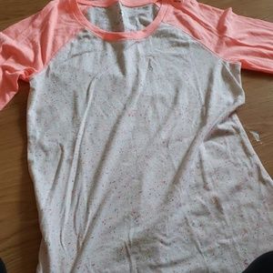 A long tee shirt. Unworn, comfy, multicolored